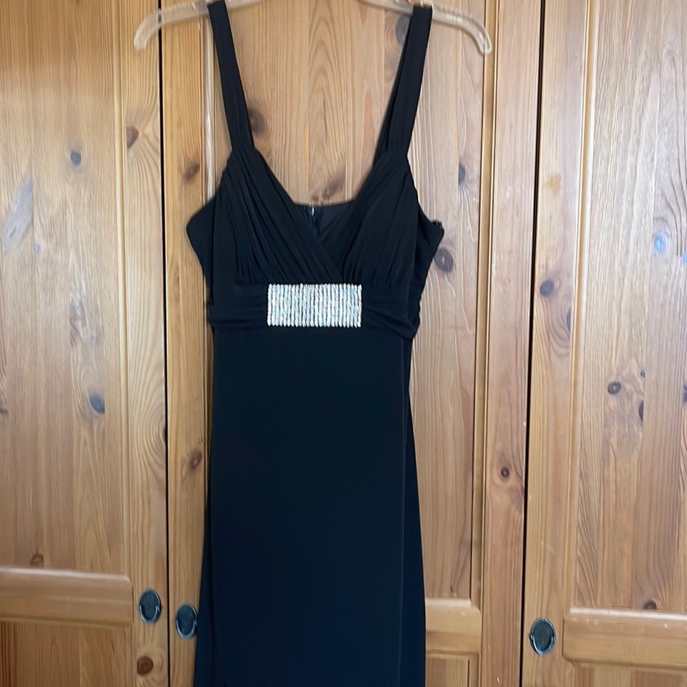 Sexy black dress ! Excellent condition only wore once.